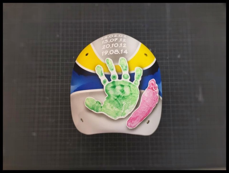 Les enfants de Leonardo Genoni colorent son masque de belle façon