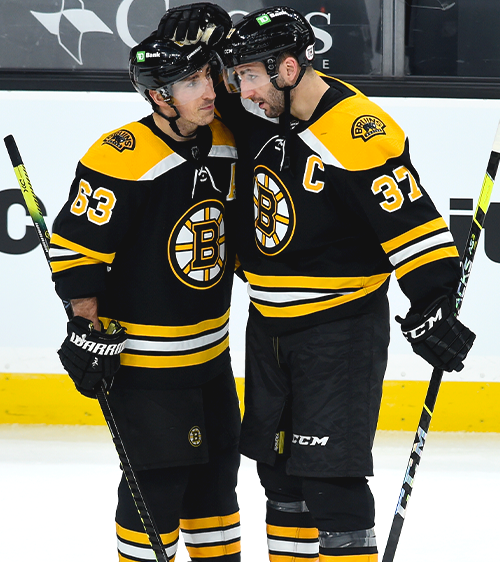 Brad Marchand et Patrice Bergeron se distinguent