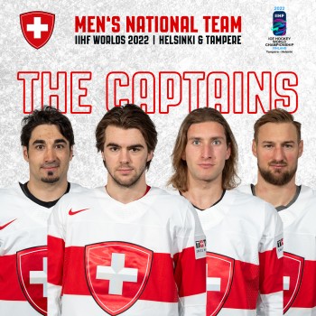 Le capitaine de l'équipe de Suisse et ses assistants